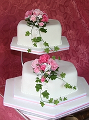 <br>
Exclusive cake company Sugar Design specialises in producing stylish, unique, and irresistibly tasty wedding cakes in Cambridge.

Liz has mastered the art of delicate detailing, and her varied skill-set of intricate sugar flowers, beautiful butterflies, elaborate twirls and even glittering crystals allows each and every cake baked in her Cambridgeshire countryside kitchen to be completely unique.

As you would expect, only the highest quality fresh ingredients go into a Sugar Design cake, and Liz is able to cater for a wide range of special dietary requirements, including gluten- and dairy-free.
<br>
<br>
Read <a href=http://www.wedding-planning-secret.com/sugar-design-absolutely-exquisite-wedding-cakes-in-cambridge-3687 target=_blank>Sugar Design</a>`s Featured Post