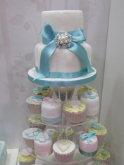 <br>
Situated just outside Romford, Angel Cakes use only the finest ingredients to custom design and create absolutely delicious wedding cakes in Essex.

Angel Cakes have been producing gorgeous wedding cakes for lucky brides and grooms for the past four years. This friendly little company formed after owner Beckie agreed to go along to cake-decorating evening classes with a friend, and discovered a true passion and talent for producing delicious, ornate wedding cakes. After being made redundant in 2007, Beckie decided to put this newfound talent to good use, and instigated Angel Cakes – she has been crafting alluring cakes in her council-approved home kitchen ever since!
<br>
<br>
Read <a href=http://www.wedding-planning-secret.com/bespoke-cakes-and-cupcakes-in-essex-angel-cakes-1949>Angel Cakes</a> featured post
